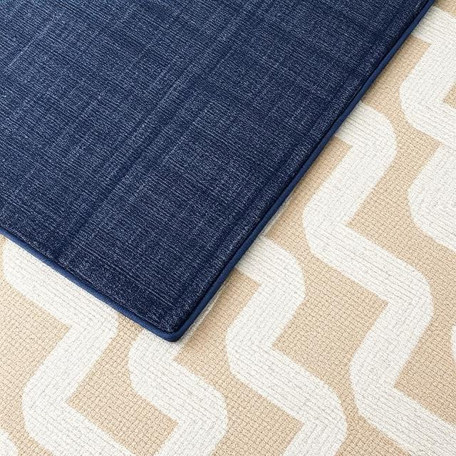 Experimentation is where the magic of rug layering thrives